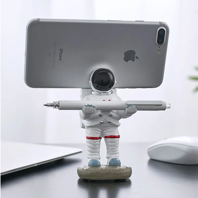 creative penholder mobile phone stand resin astronaut figurine home decoration office desk accessories practical desktop holder free global shipping