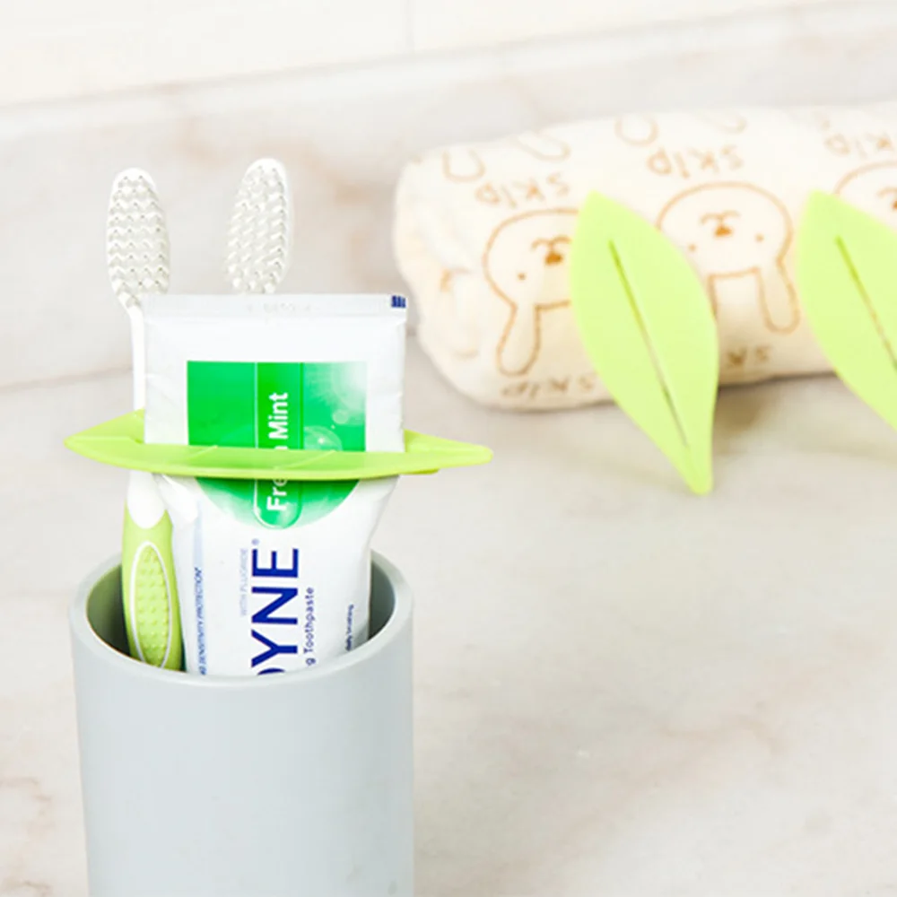 

2Pcs/set Manual Toothpaste Squeezer Squeeze Tooth Paste Tube Dispenser Toothpaste Clip Cosmetics Cleanser Extruder Leaf Shape