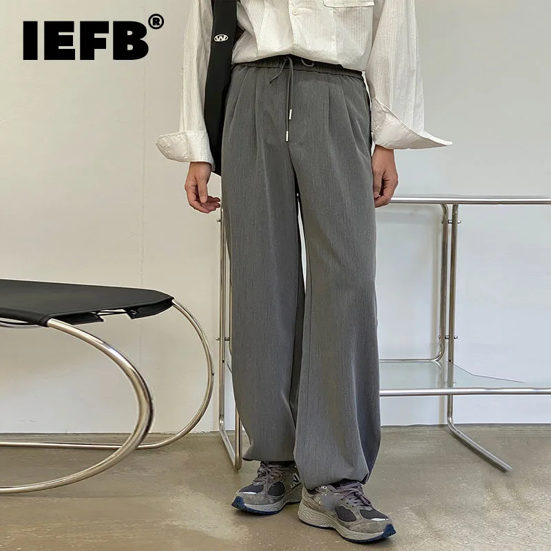 

Осенние корейские свободные повседневные брюки IEFB, мужские облегающие леггинсы с высокой талией, брюки черного и серого цветов с кулиской, ...