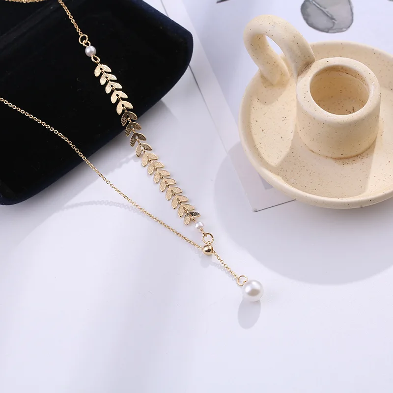 

Golden Wheat Super Fairy Clavicle Chain New Pearl Pendant Necklace Ins Personality Asymmetric Necklace 2021 Female Jewelry