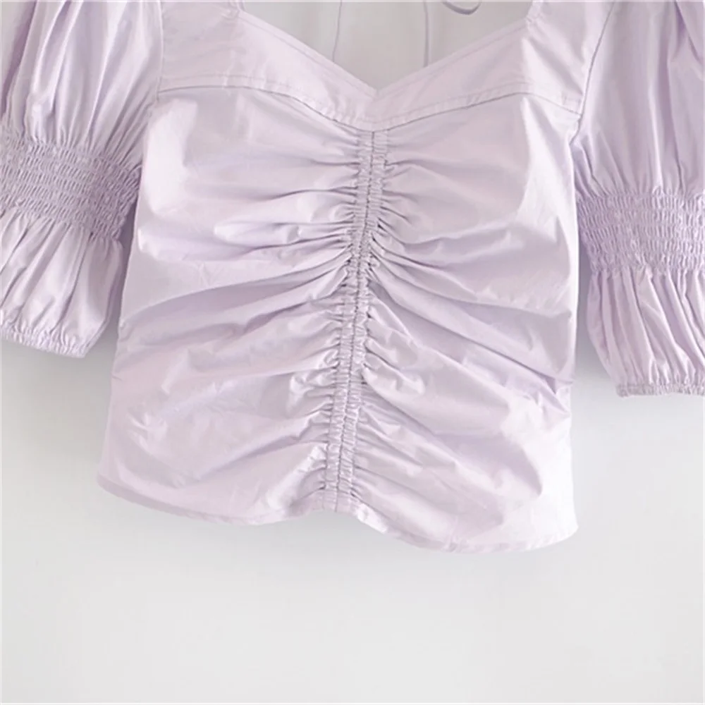 

2020 summer women's new retro square collar lantern sleeves were thin and pleated halter strap solid color short shirt