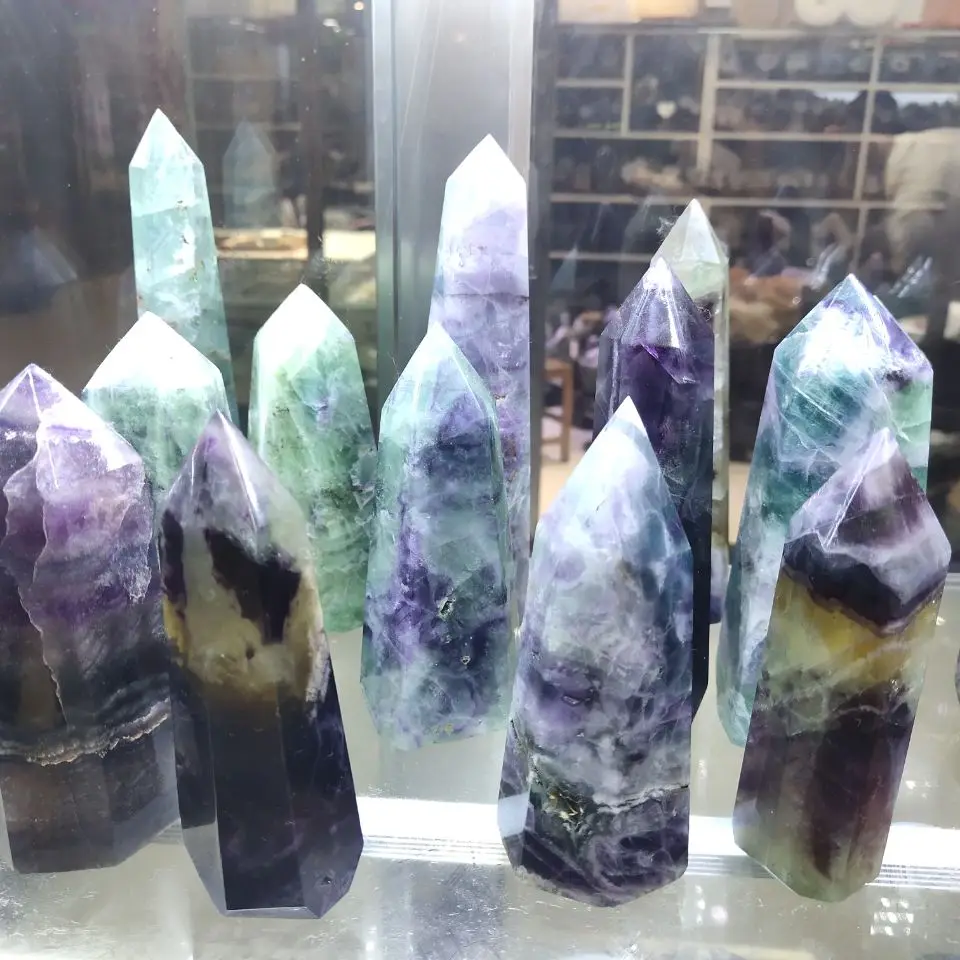 

Natural polychromatic and colorful fluorite ore quartz crystal rod point column mace column healing