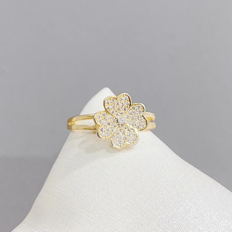 

Wholesale Four-Leaf Clover Micro-Inlaid Zircon Ring Opening Adjustable Fashion Peach Heart Forefinger