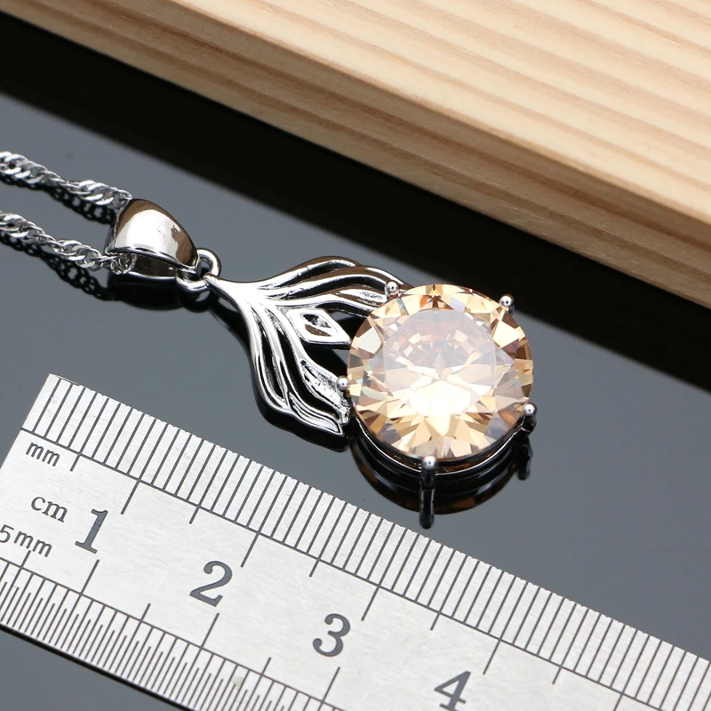 Комплект из колье и серёг серебра 925 пробы с топазом