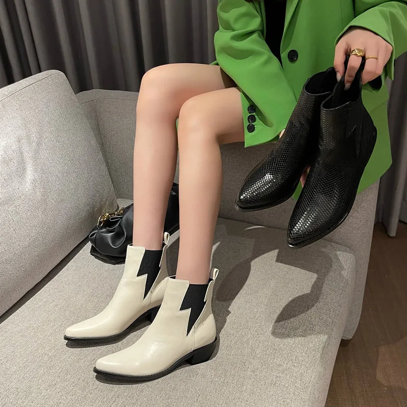

European and American autumn and winter new fashion snake print thick heel short boots female high heel pointed Martin boots