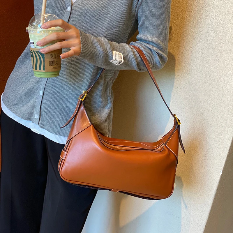 

2021autumn and winter new one-shoulder armpit bag leather hand stitching solid color commuter tote bag large capacity female bag