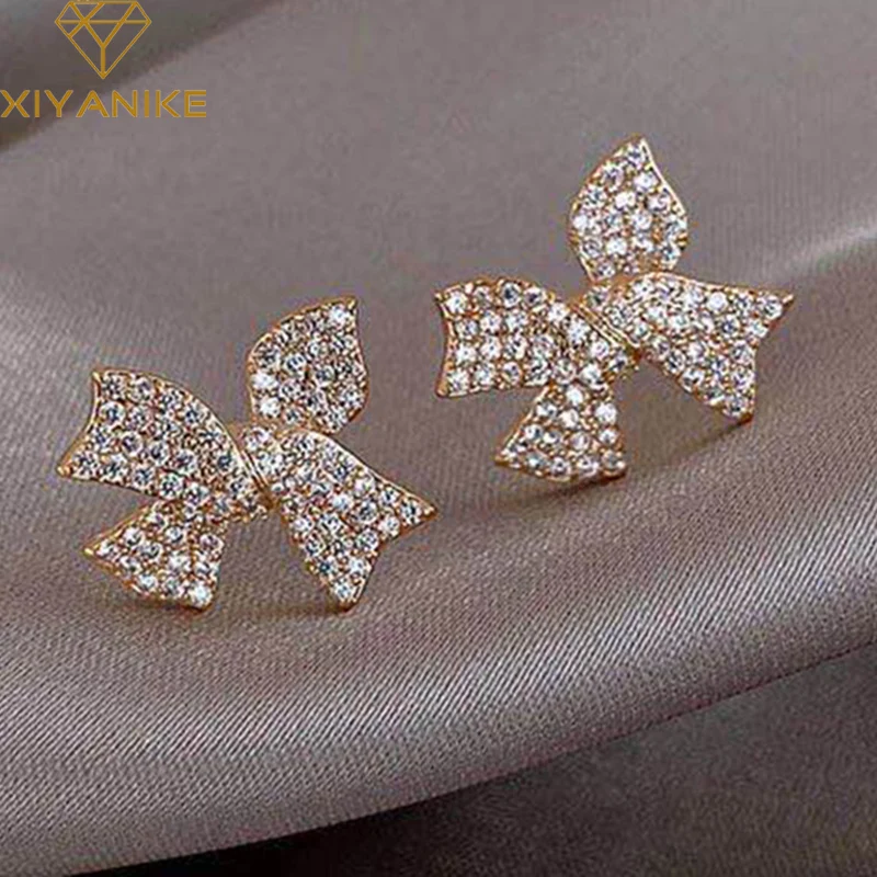 

XIYANIKE Rhinestone Luxury Earrings Studs Shiny Bowknot Earrings For Women 2020 New Small Elegant Fashion Jewelry Wholesale