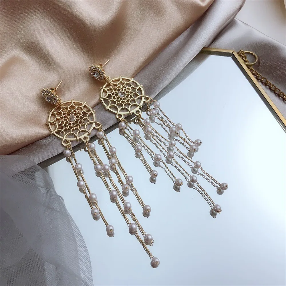 Длинные висячие серьги с кисточками женские элегантные предотвращающие