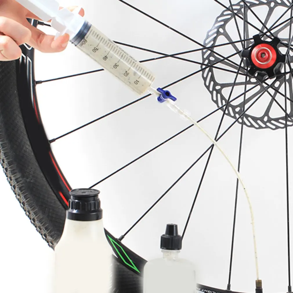 

MTB Mountain Road Bicycle Bike Tubeless Sealant Injector With Multifunctional Valve Valve Core Tool For Bike Tubeless Tire