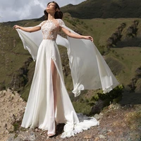 bohemian chiffon wedding dresses with cape 2021 a line side slit o neck lace appliques sexy open back sweep train bridal gown