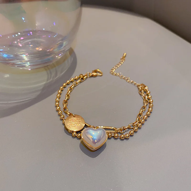 

Korean fashion personality trendy pearl love round brand letter bracelet female temperament exquisite bracelet