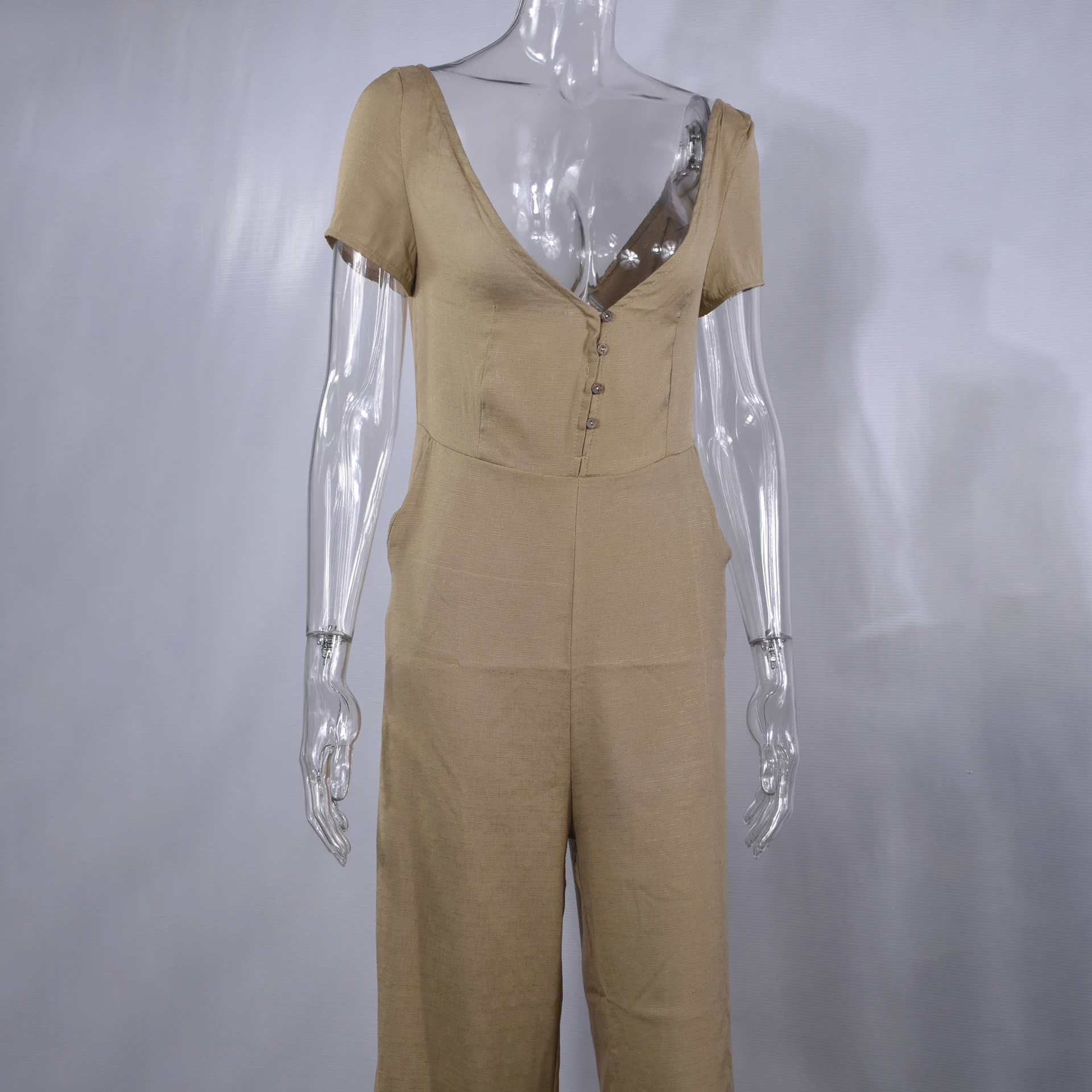 Женский свободный комбинезон Lossky белый Облегающий на кнопках с треугольным