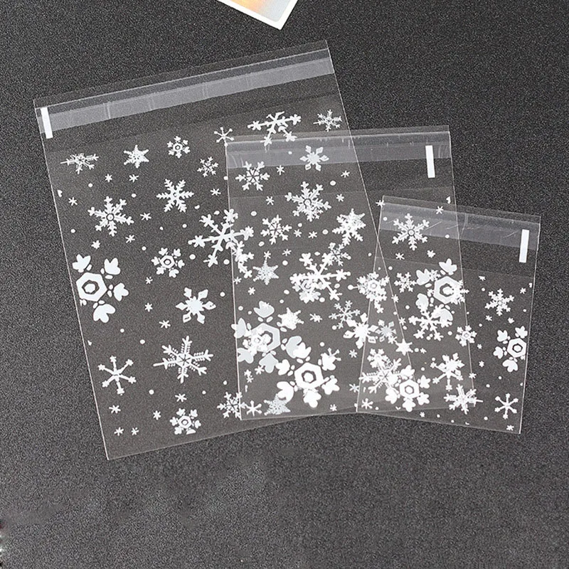 

50pcs Pieces Transparent Plastic Snowflake Candy Bag Cookie Gift Bag DIY Adhesive Pouch Wedding Birthday Party Christmas Decor