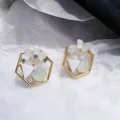 Женские серьги гвоздики из металлической проволоки с прозрачными