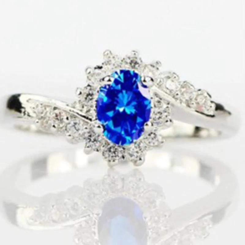 

Exquisite Simple Twist Arm Four Claw Crystal Ring Charm Lady Inlay Blue Zircon Ring Elegant Wedding Anniversary Jewelry Gifts