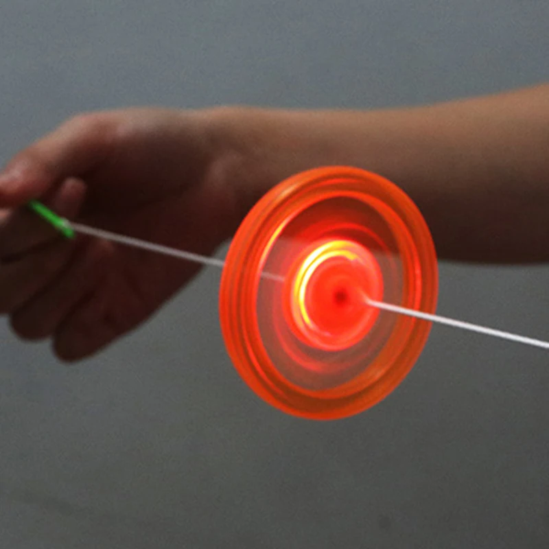 

1pc Fire Wheel Glow Flywheel Whistle Flash Pull Line Led Flywheel Hot Creative Classic toys for Children Gift