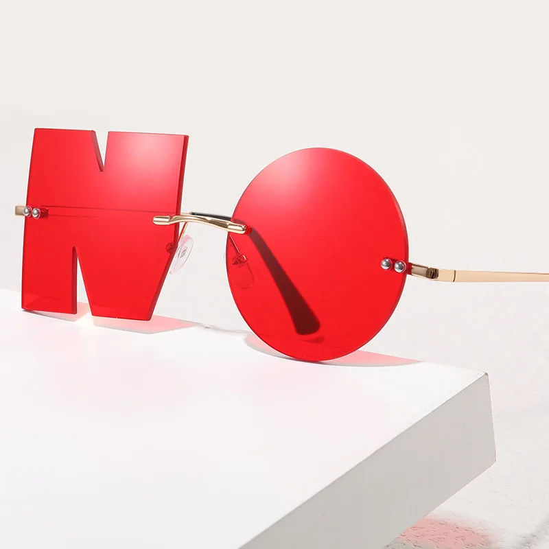 

Солнечные очки без оправы в стиле панк для мужчин и женщин, модные солнцезащитные аксессуары с надписью, в стиле ретро, с защитой UV400, с защит...