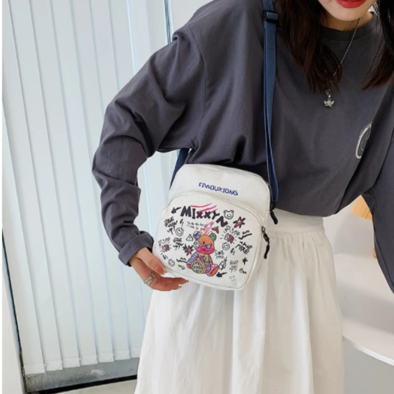 

Koreanedition tide is cool doodle canvas small bag 2021 new style young woman single shoulder mobile phone bag slant zero purse