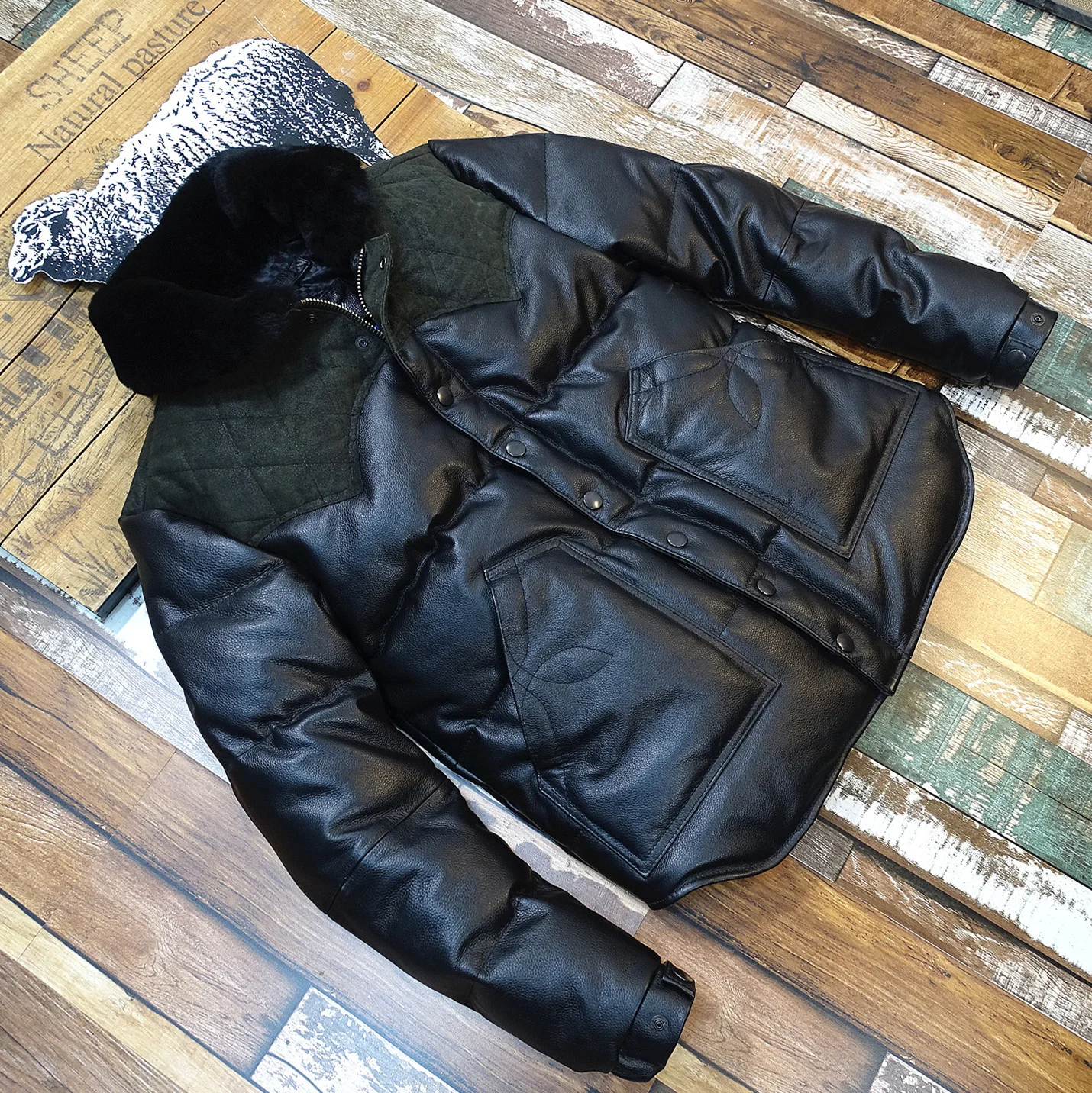 

Теплая пуховая куртка из воловьей кожи с меховым воротником