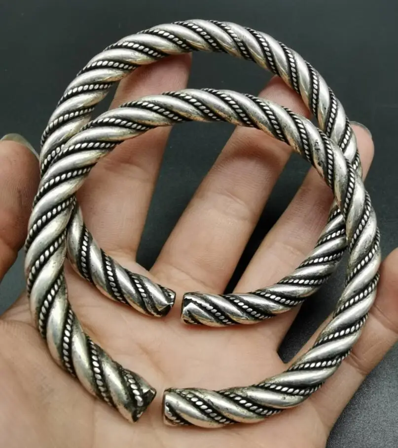 

Браслет Archaize из белой меди со спиральным узором пара