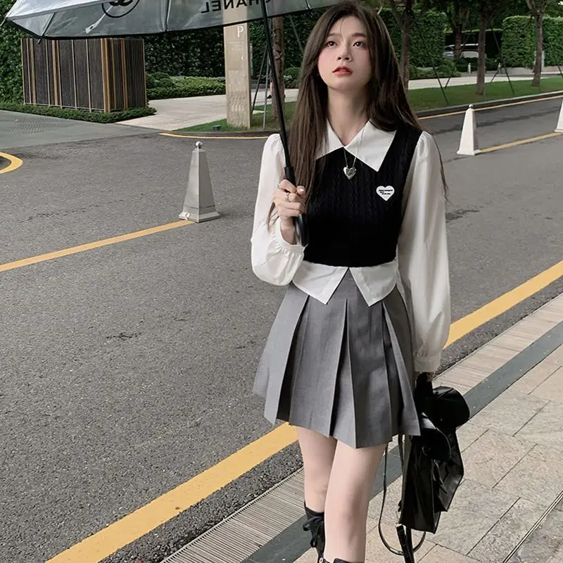 

Preppy style suit women fake two-piece knitted patchwork shirt A-line skirt autumn new Korean temperament two-piece suit trend
