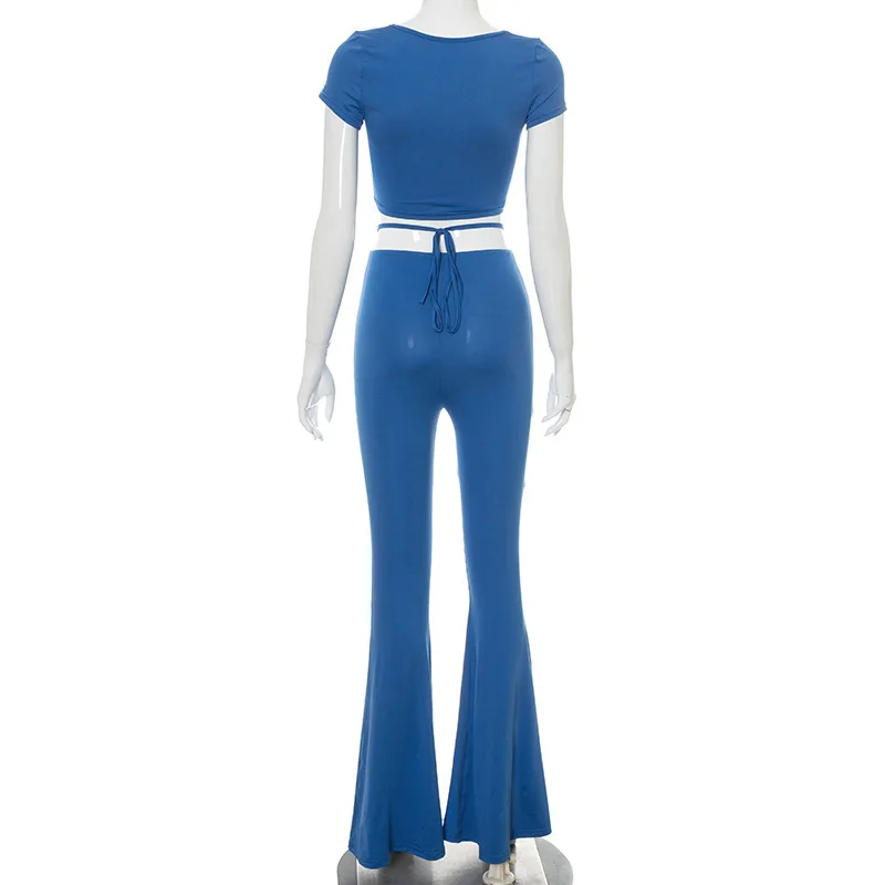 

Sibybo Blue Sexy Matching Sets Women Hollow Out Short Sleeve Crop Top And Bandage High Waist Flare Pants Two Piece Outfits 2021