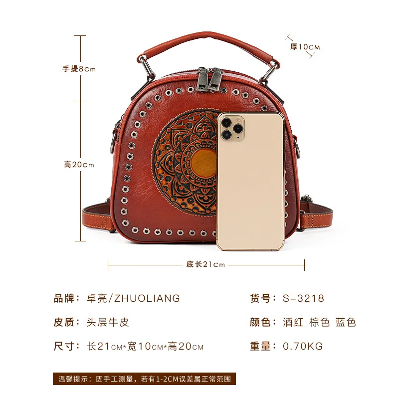 Women's bag 2021 new leather women's head round hole totem portable single shoulder |