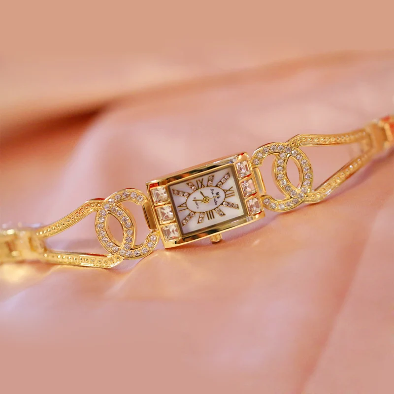 Лидирующий бренд роскошные королевские Золотые женские часы кварцевые ремешок