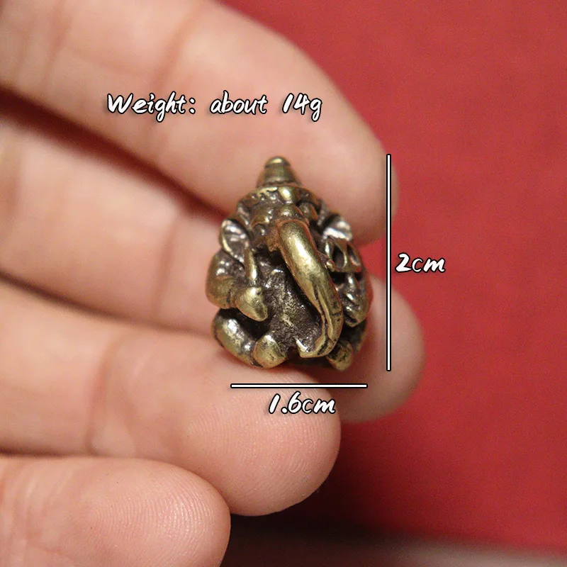 

Мини статуя Лорда Ганеши из меди