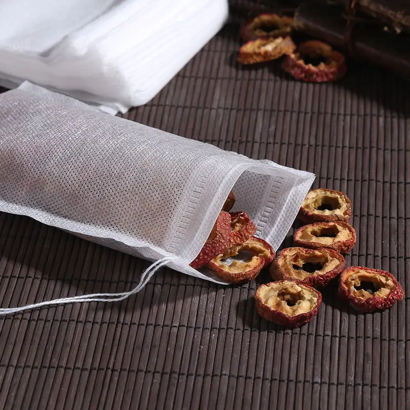 

100Pcs/Lot Food Grade Non-woven Fabric Tea Bags Scented Drawstring Pouch Tea Filter Bags Seal Spice Filters Teabags