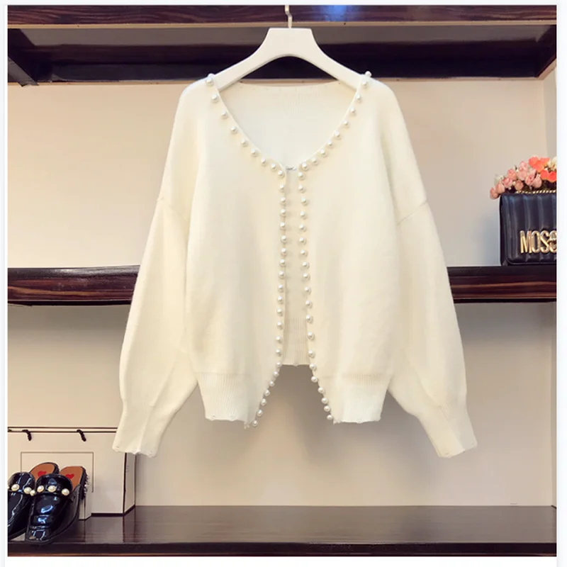 Женский длинный кардиган на пуговицах однотонный с контрастным принтом и