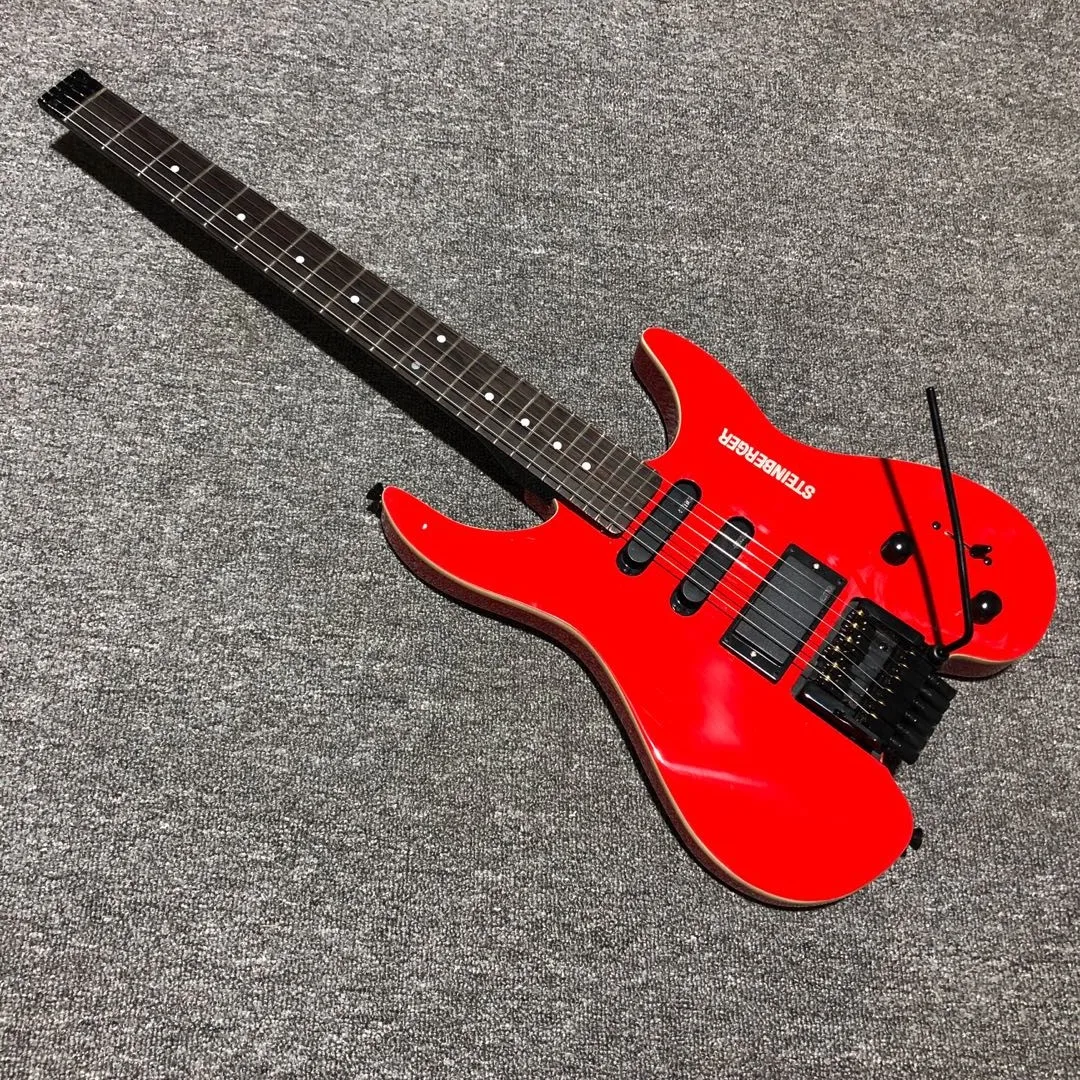 Электрогитара без головы steinбергера красного цвета с активным звукоснимателем