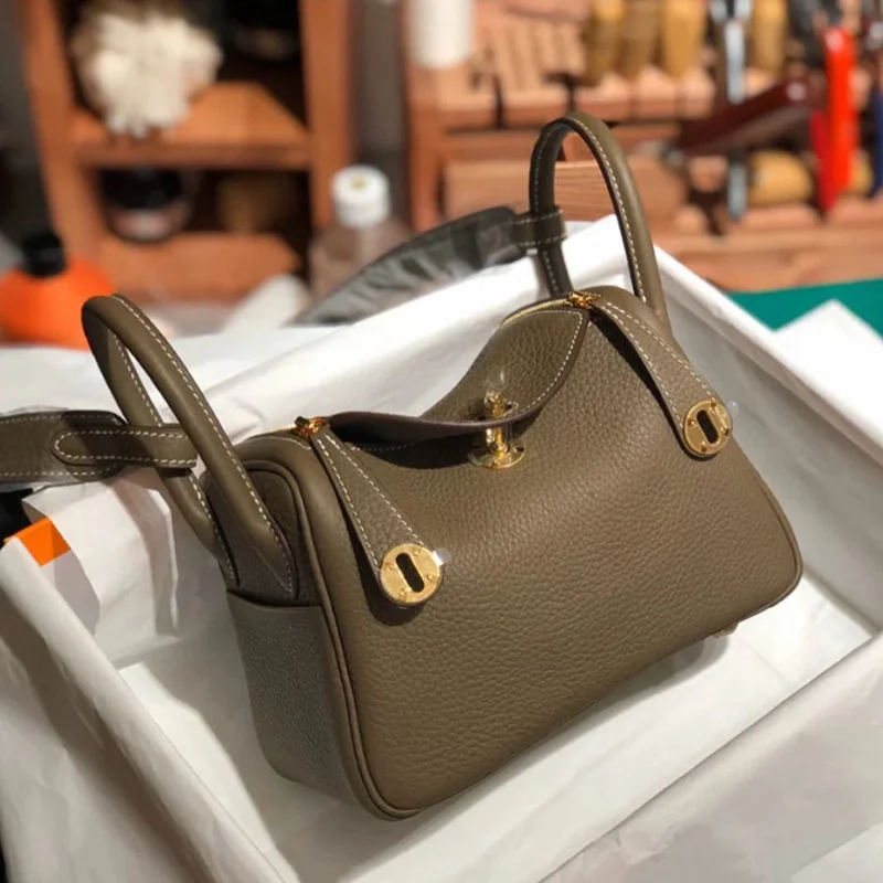 

2021 new leather women's bag top leather Lindi bag gold buckle doctor's bag one shoulder portable women's medicine bag women's