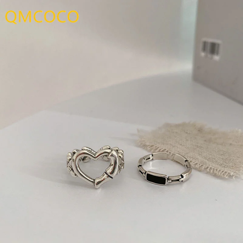 

QMCOCO Silver Color Finger Rings Women Couples New Fashion Creative Hollow LOVE Heart Shape Chain Geometric Delicacy Jewelry