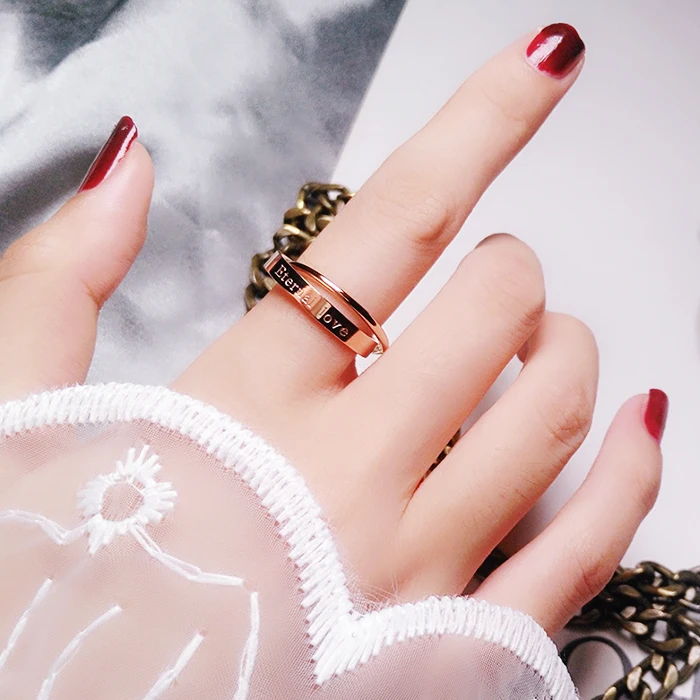 Женское кольцо с двойной петлей из титановой стали цвета розового золота |