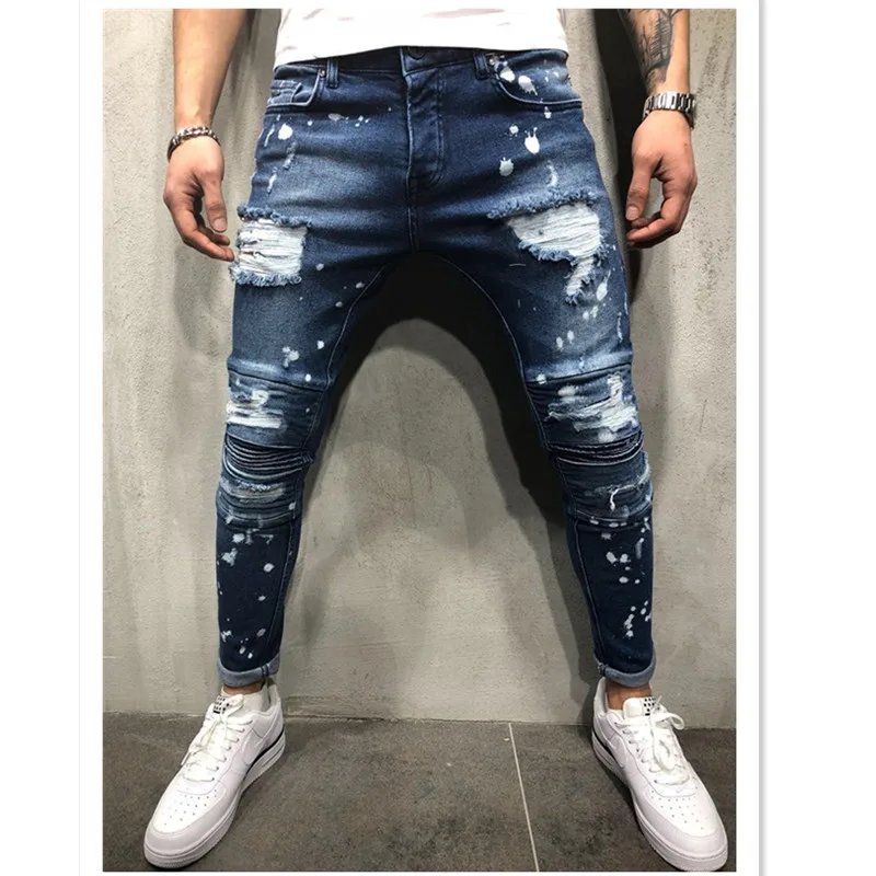 

New Men‘s Ripped Painted Slim Fit Pleated Denim Pants Stretch Snowflake Point Wash Painted Hip-Hop Jeans Motor Biker Skinny Jean