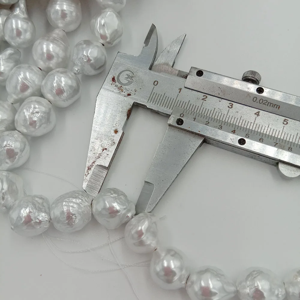 Пресноводные жемчужины в форме барокко большие 11-13 мм x 14-18 100% пресноводные. Цвет с