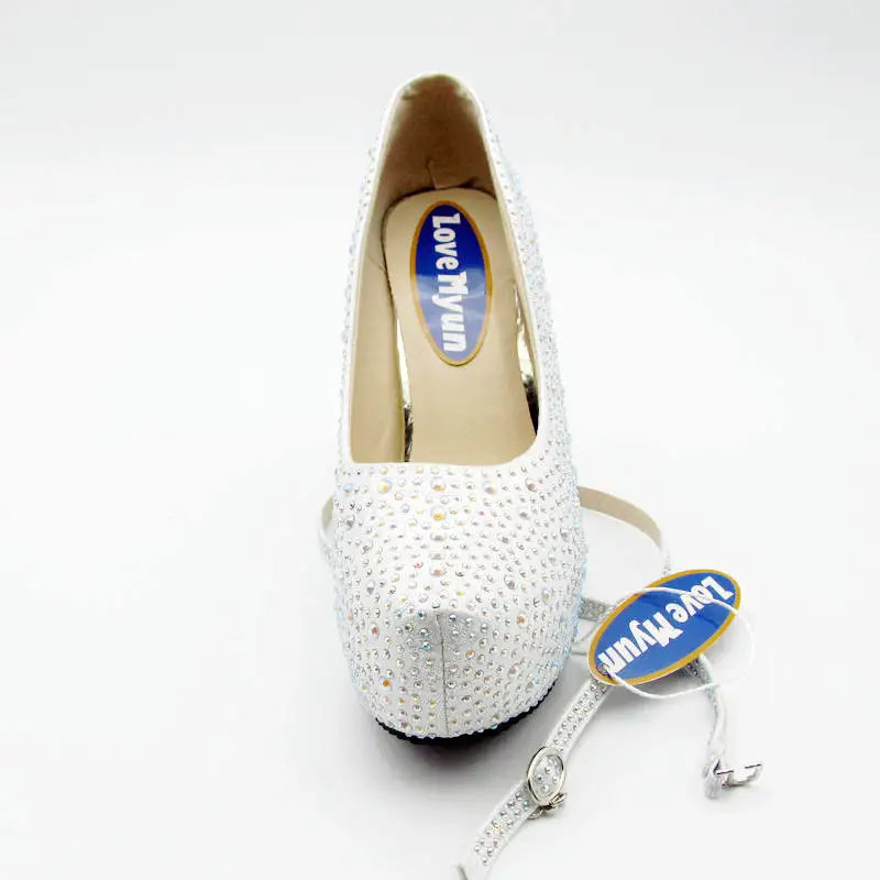 Женские свадебные туфли на высоком каблуке со стразами серебристые блестящие