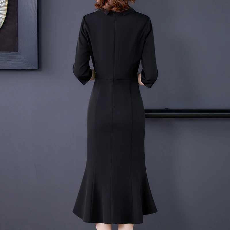 Женское длинное осеннее трикотажное платье с вышивкой длинным рукавом и