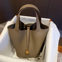 2021 new color matching basket bag leather bucket bag lychee grain head layer leather simple versatile hand bag for women