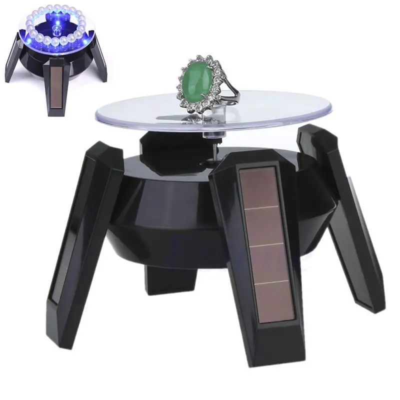 

Rotating Solar Powered Mobile Phone Watch Jewellery Display Stand + LED Light