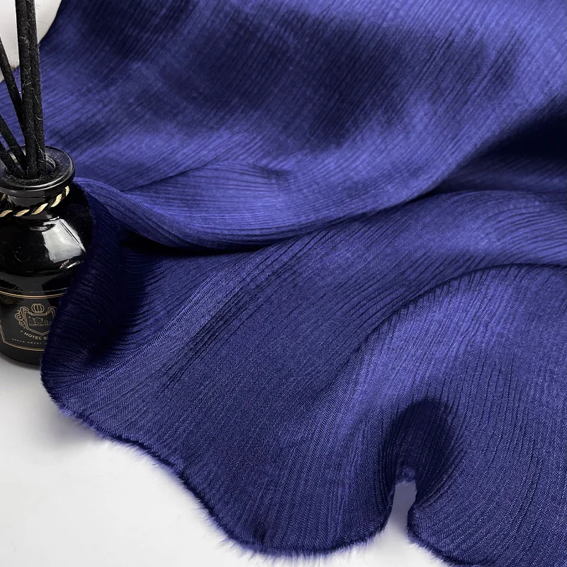 

Ultra thin glossy soft dark blue solid color pleated texture mulberry silk cotton blended silk fabric clothing fabric