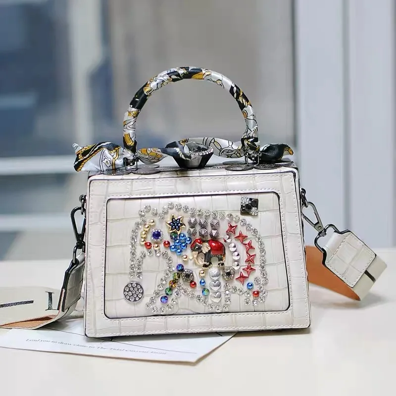 

Fashionable hand bag new women's small suitcase bag elephant bag bag wide shoulder belt stone pattern small square bag