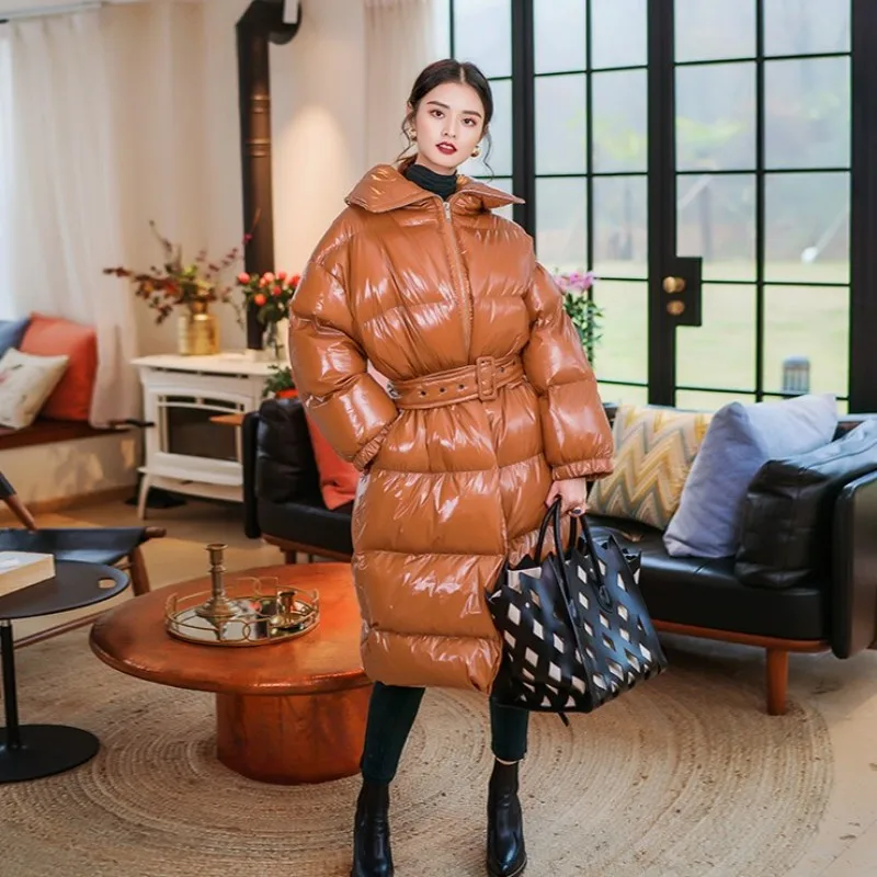 Куртка женская зимняя глянцевая из лакированной кожи длинная ветрозащитная