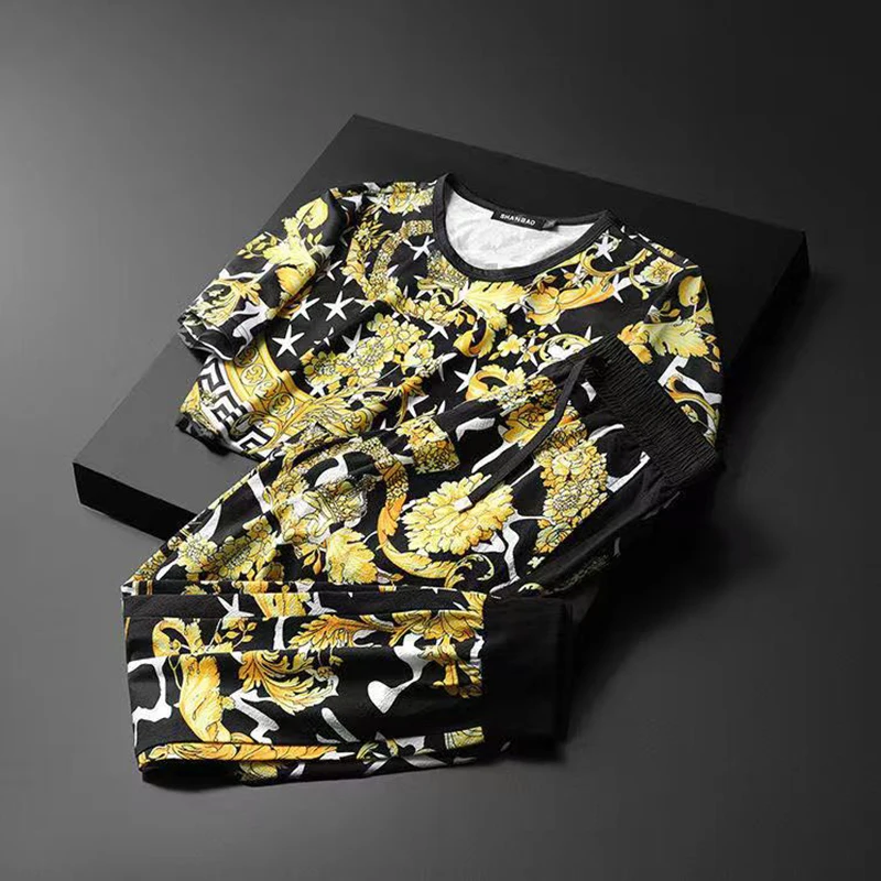 

2020 new European and American summer ice silk T-shirt suit men's trend casual sports short-sleeved trousers two-piece