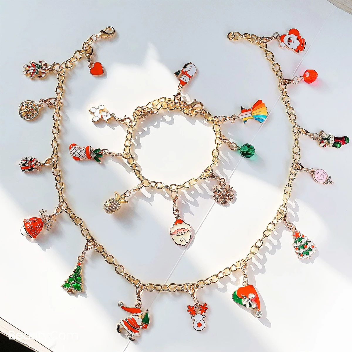

24 Days Christmas Calendar Advent 2021 Xmas Calendar Countdown with 1 Bracelet 1 Necklace and 22 DIY Charms Jewelry Set