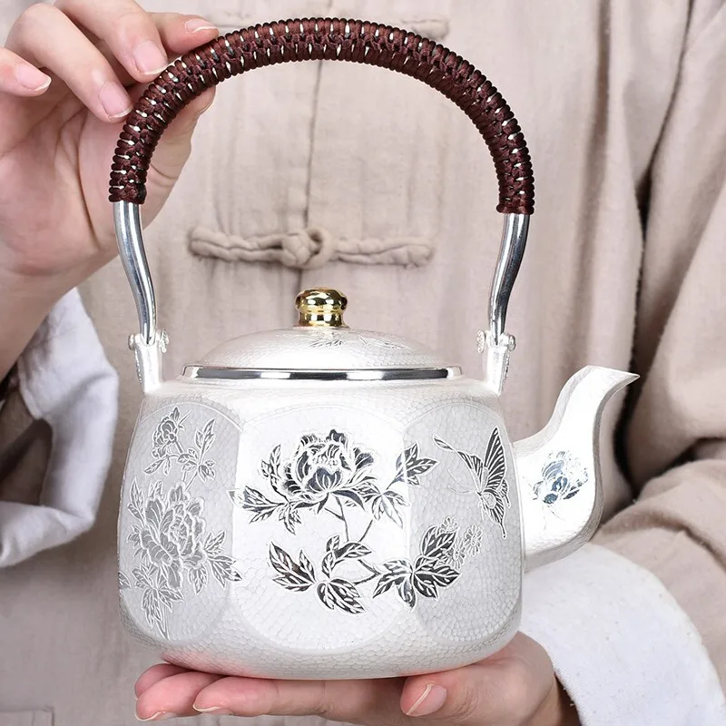 

Peony flower sterling silver teapot handmade sterling silver 999 kettle household anti-scalding Kungfu tea set 706g, 1L
