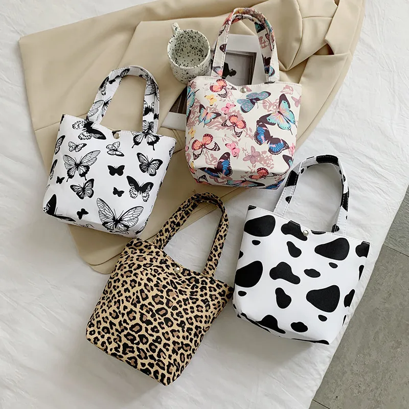 

2021 Hit New Cow Print Nylon Cloth Tote Bag Cheap Women's Bags Leopard Fashion Trend Casual Small Handbag Luxury Designer Bolsas