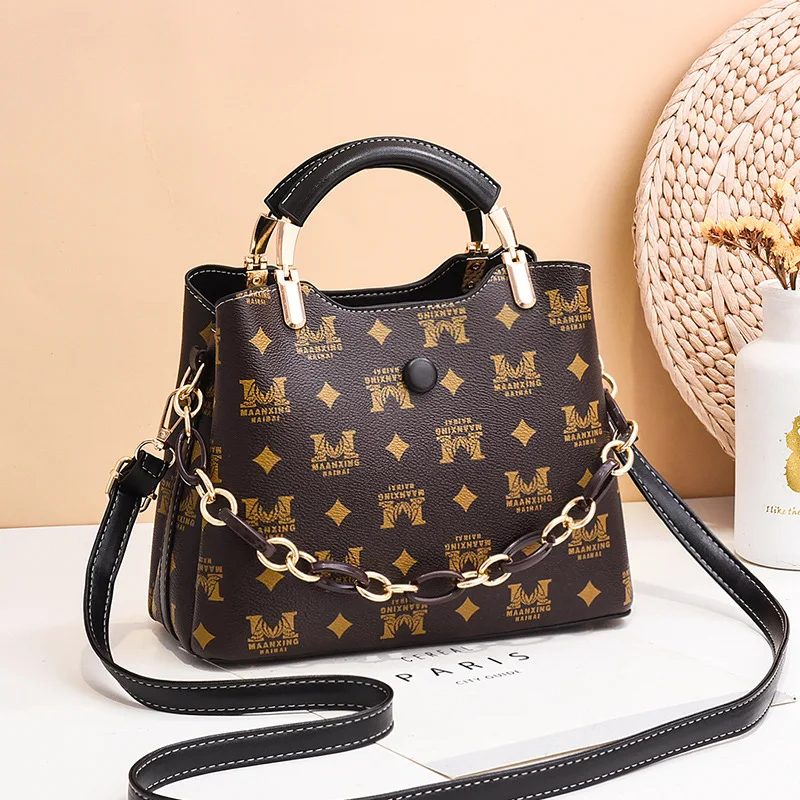 

Luxury Designer High Quality 2021 Fashion Women Hand Messenger Bag Retro Chain Bucket Bag Cartoon Print Shoulder Bag Bolso Mujer