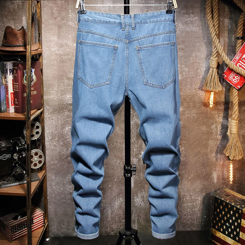 Узкие локомотивные потертые брюки рваные европейские и американские мужские